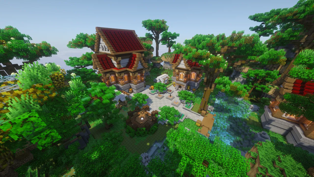 Aerial shader photograph of the green lobby island, red-roofed houses, paths and a stream